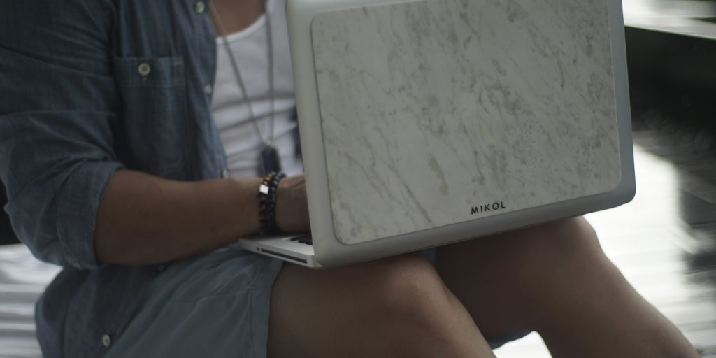 white samsung tablet computer on persons lap