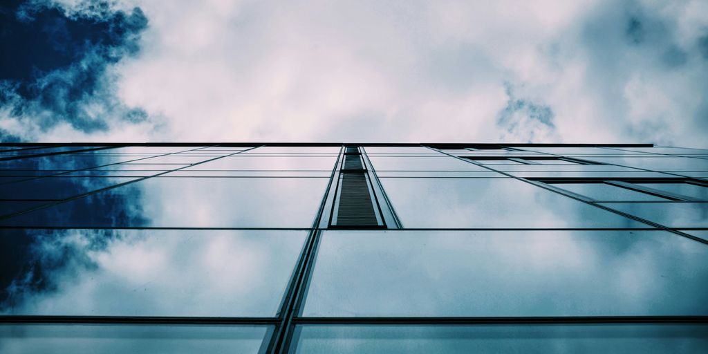 worm's eye view photo of glass building