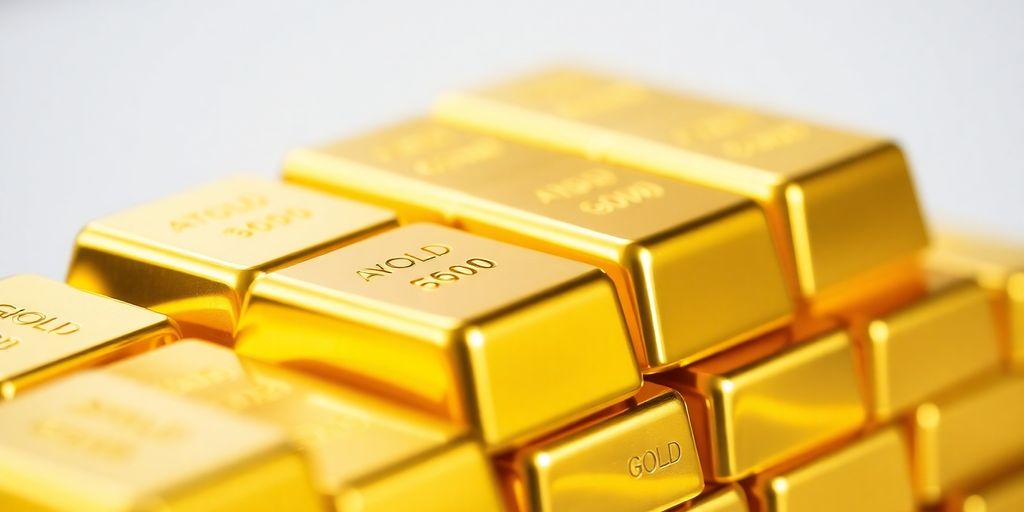 Barres d'or brillantes empilées sur fond flou.