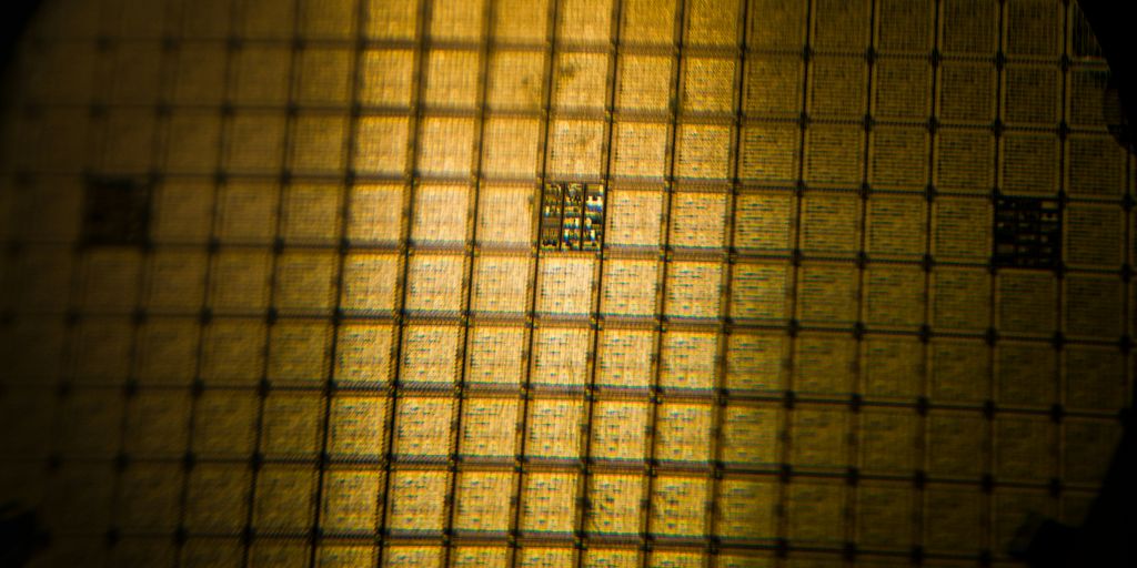 A close up of a yellow light in a dark room