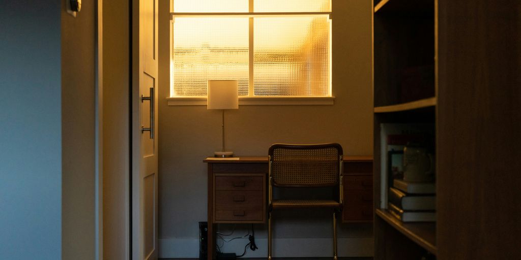 white table lamp on brown wooden table
