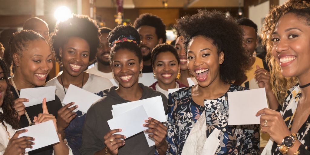Artists celebrating receiving funding.
