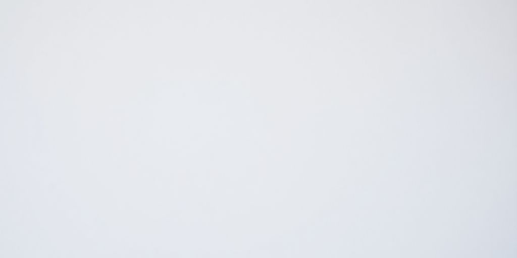 Smooth, freshly painted wall with a soft sheen.