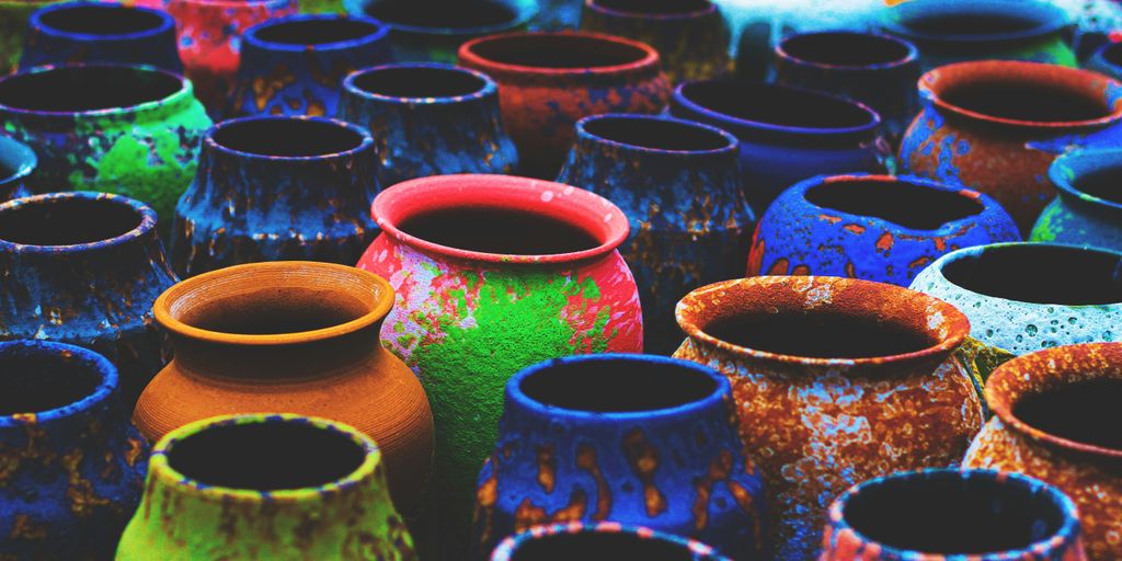 blue green and red clay pots