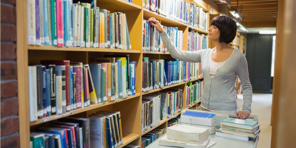 research assistant working with scientific papers and data, futuristic workspace, technology and innovation