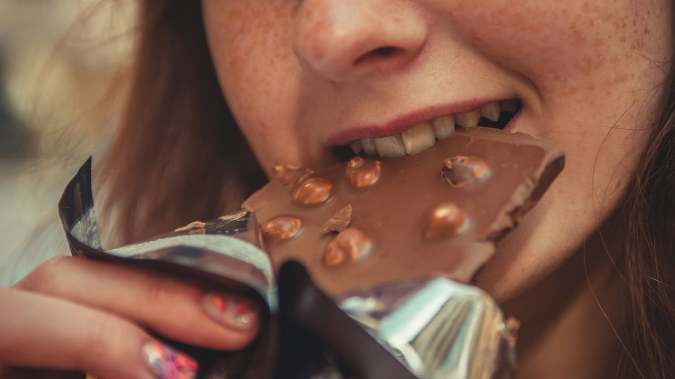 woman eating chocolate