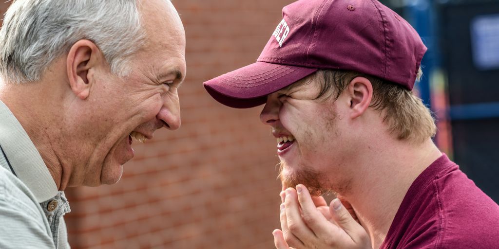 two man laughing at each other