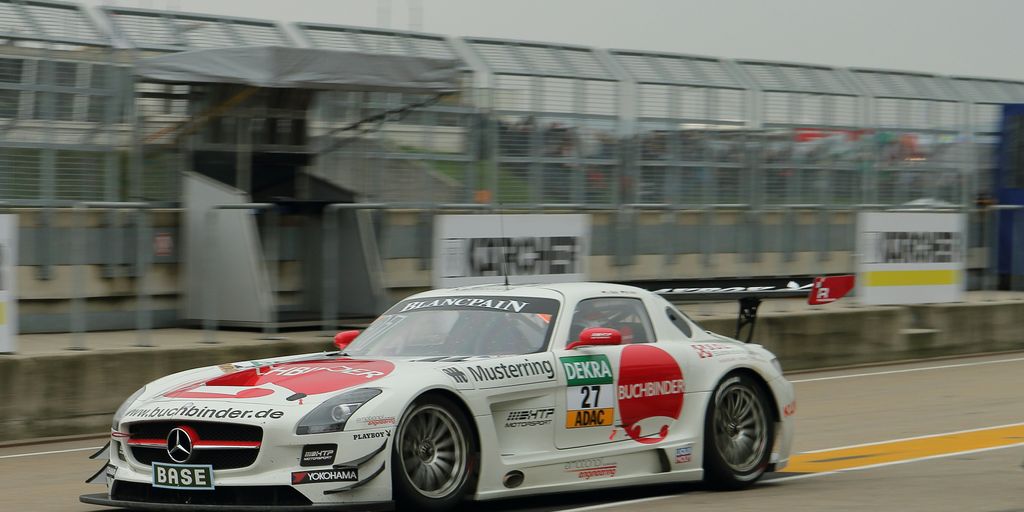 white and red Mercedes-Benz car on road