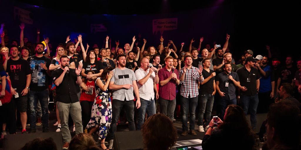 Comedians performing on stage at Edinburgh Fringe.