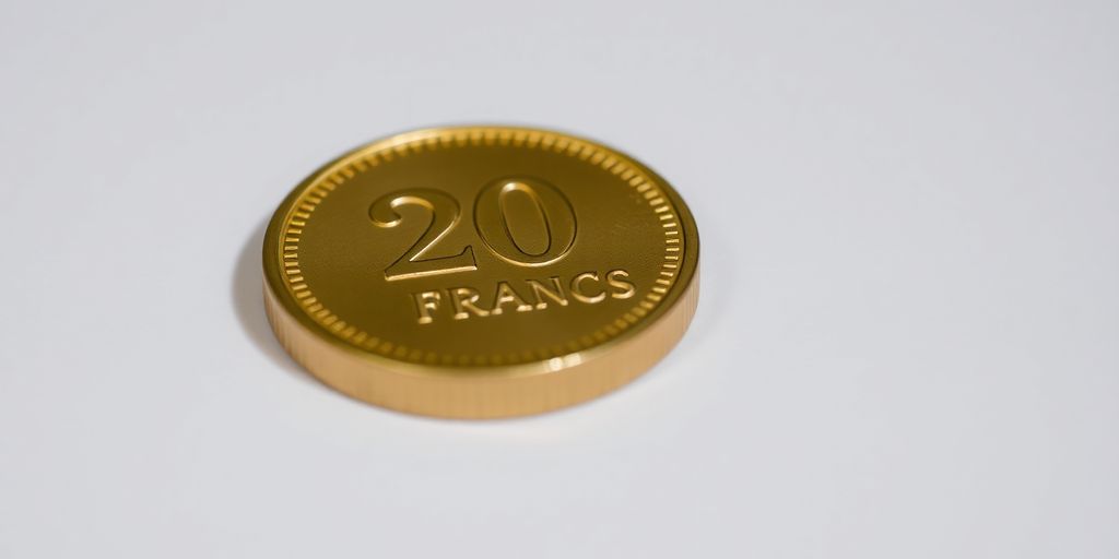 Une pièce d'or de 20 francs suisses de près.