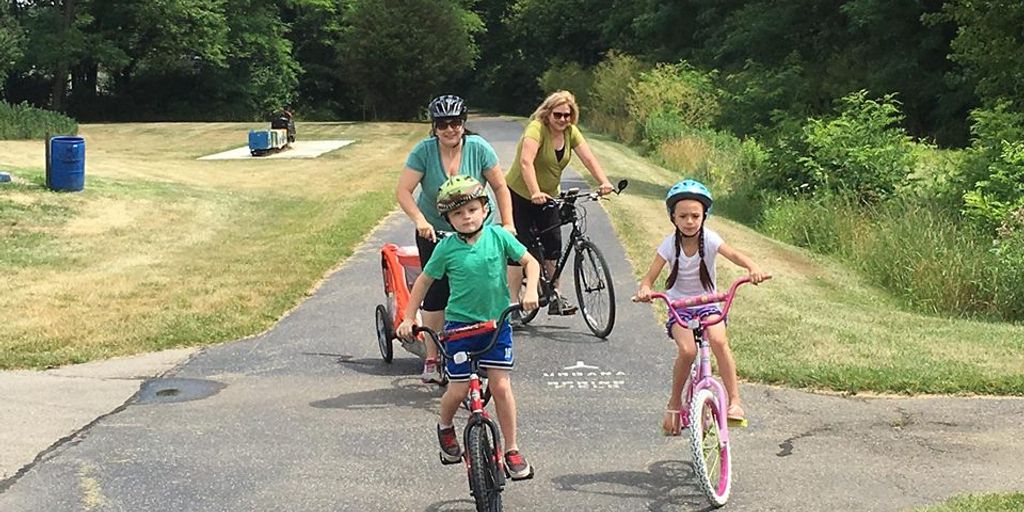 cyclists on a scenic trail in Chesapeake park
