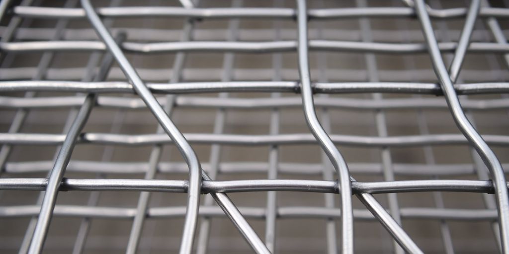 Close-up of welded wire mesh grid pattern.