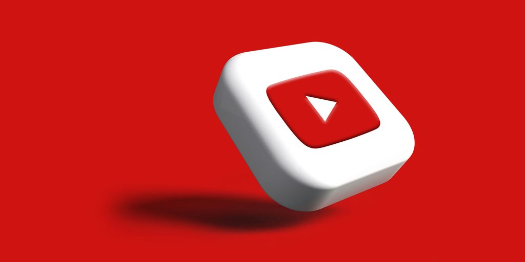 a white cube with a red arrow on a red background