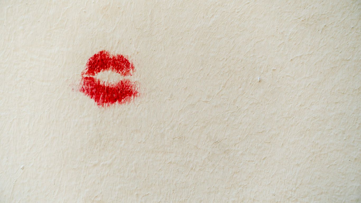 red stain on white wall