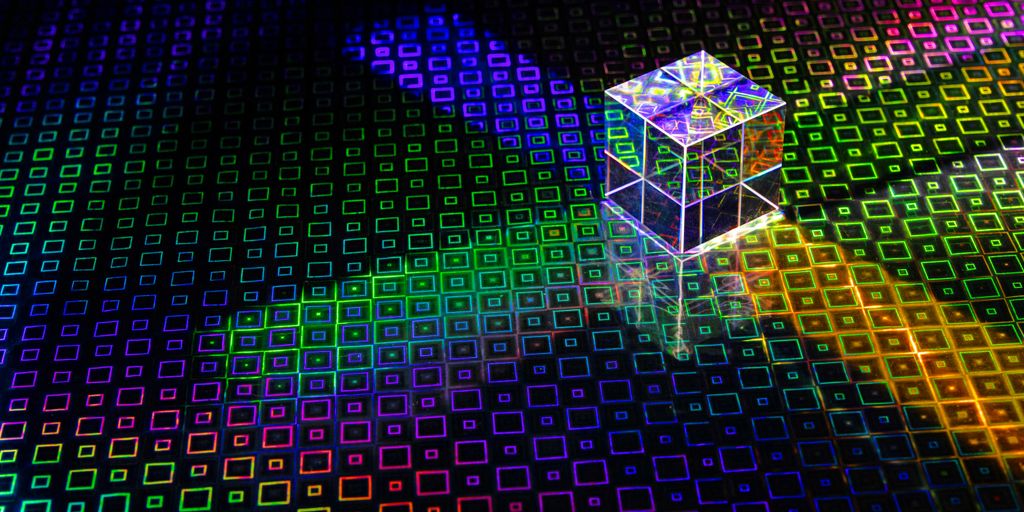 a colorful cube with a bright light coming out of it