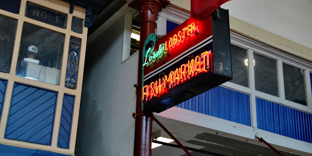 a sign that is on the side of a building