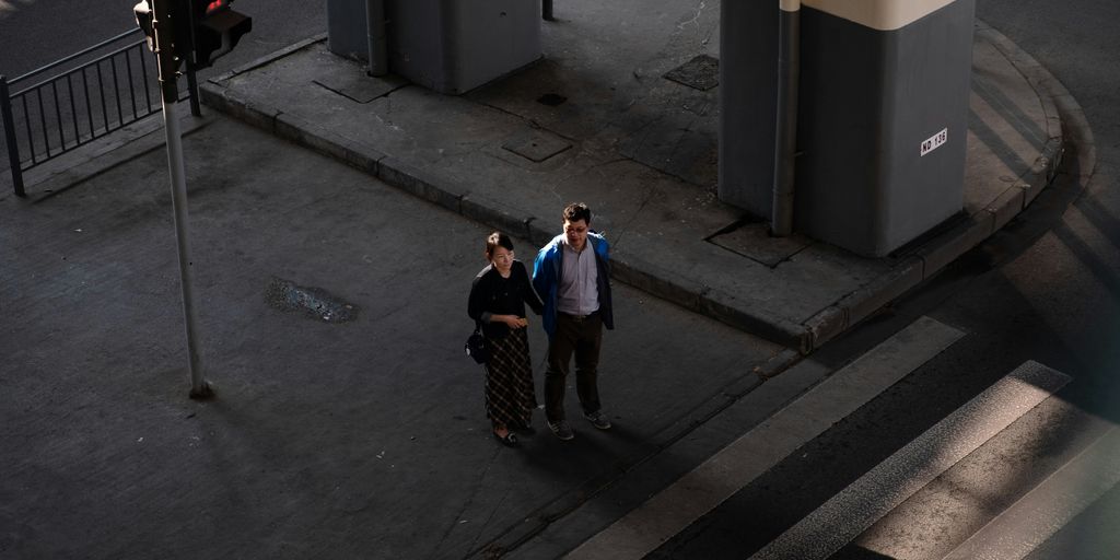 two people on intersection