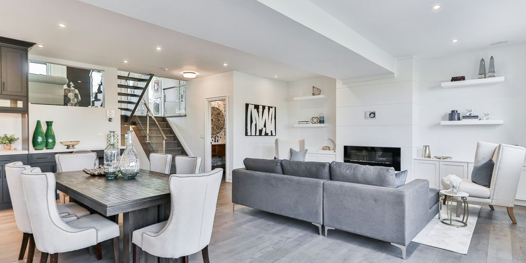 black and white wooden table and chairs