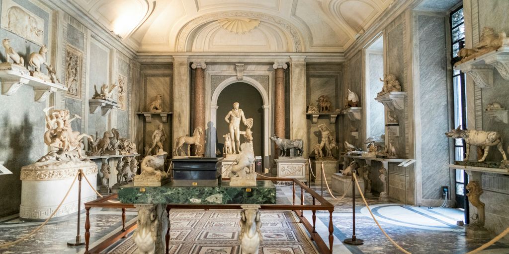 a room with statues and a table