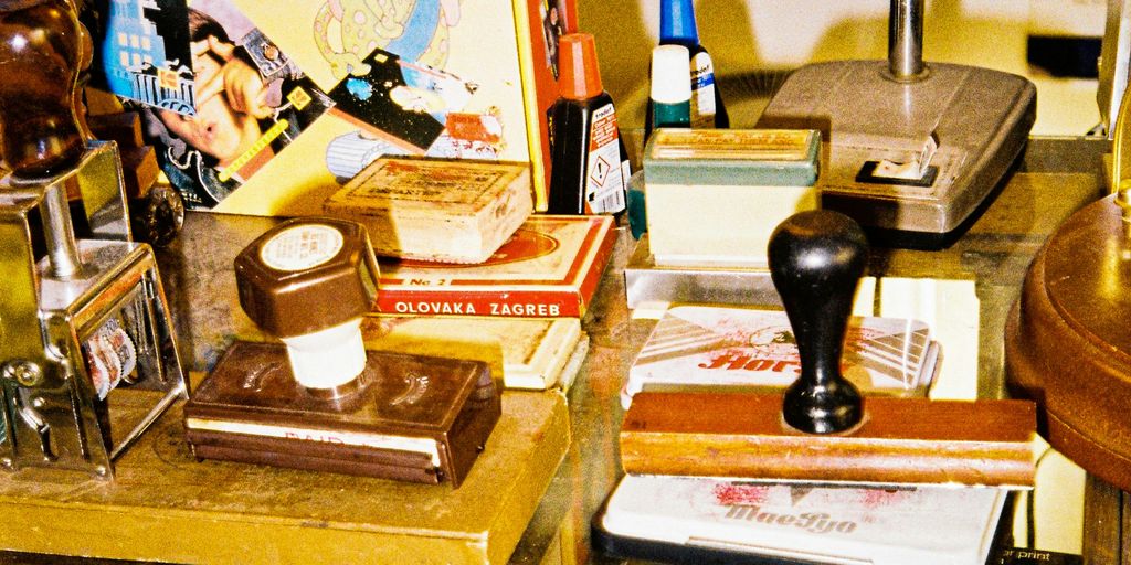 black and brown chess piece on brown wooden table