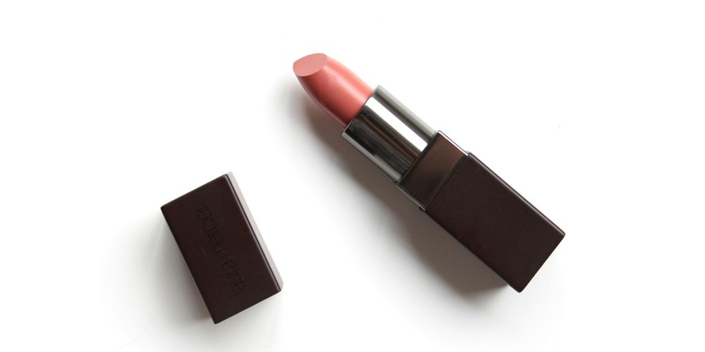 red lipstick on white surface