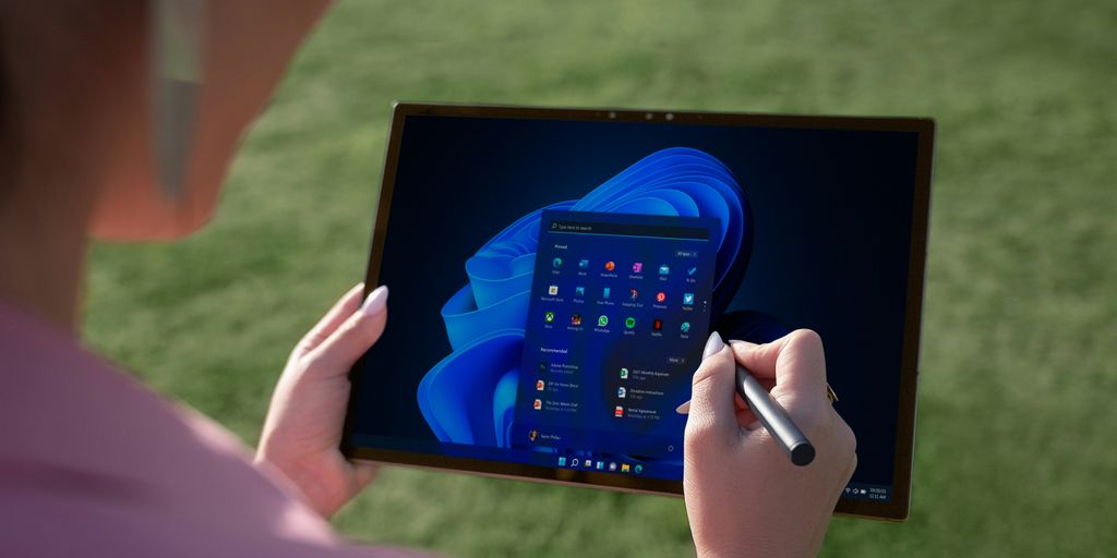 a person holding a tablet