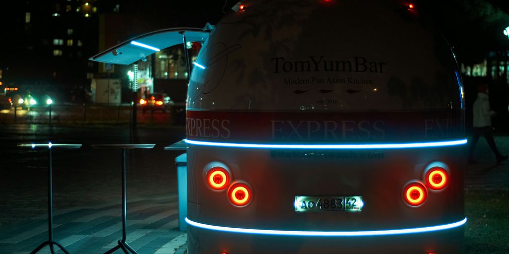 a bus that is sitting on the side of the road