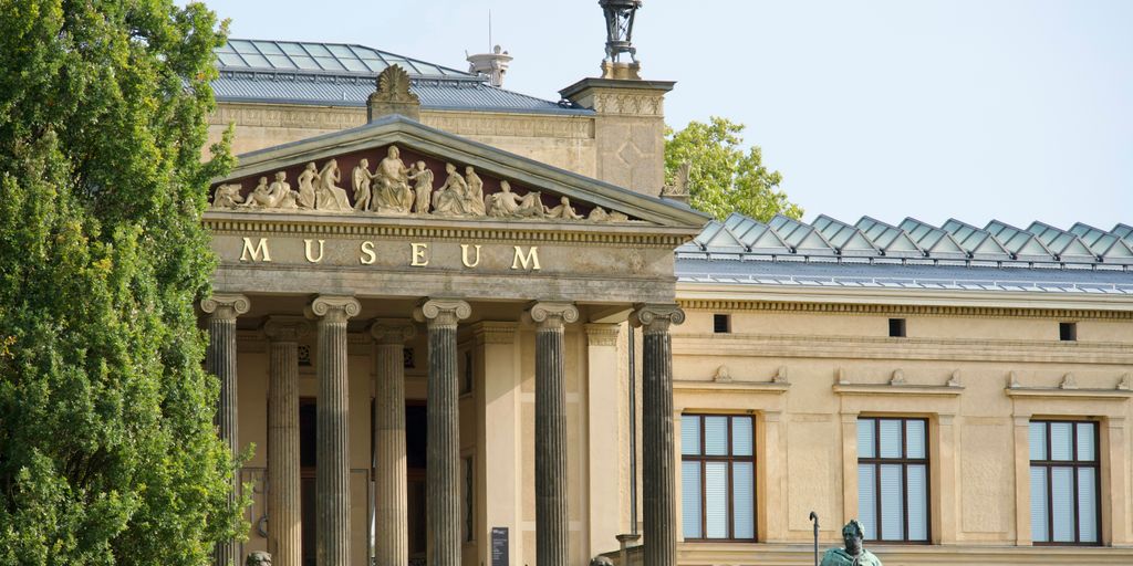 a building with a statue in front of it
