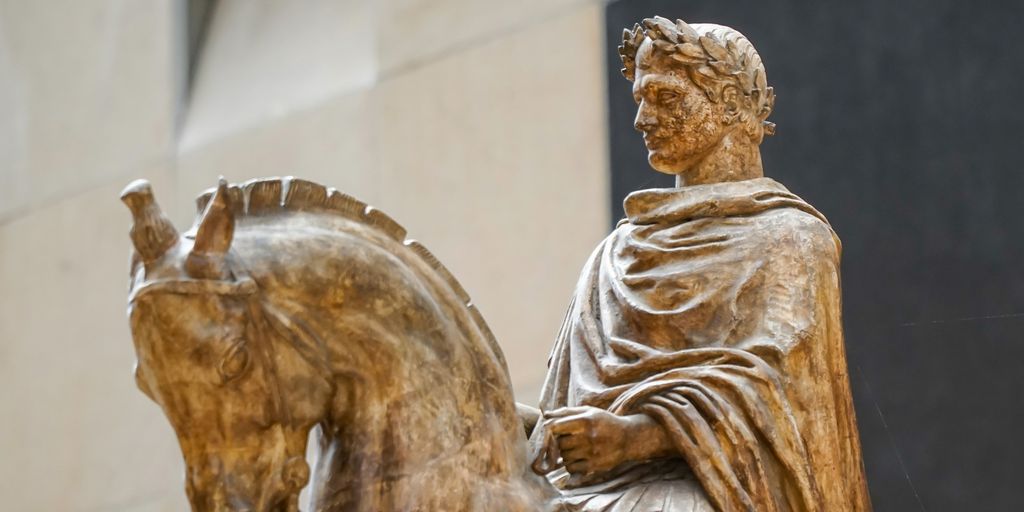 A sculpture depicts a man on horseback.