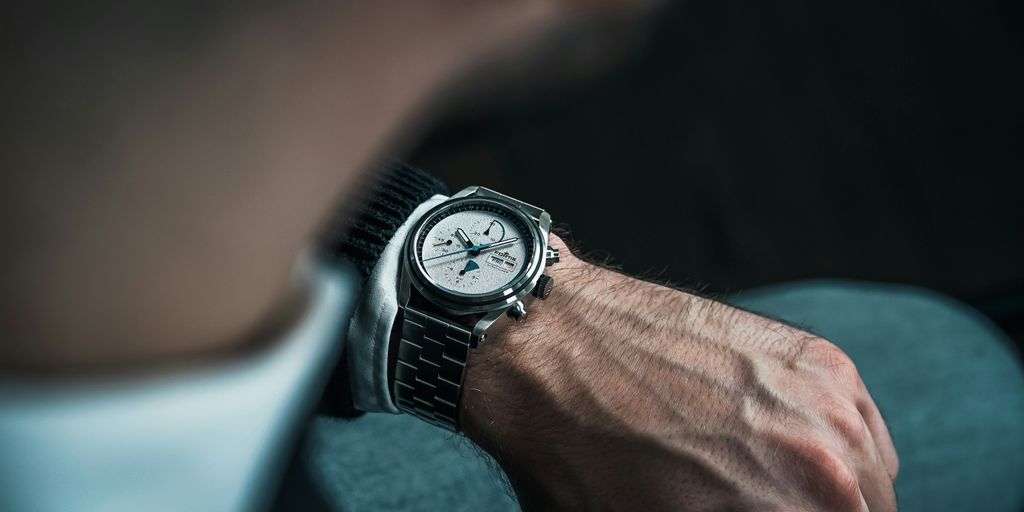 a close up of a person wearing a watch
