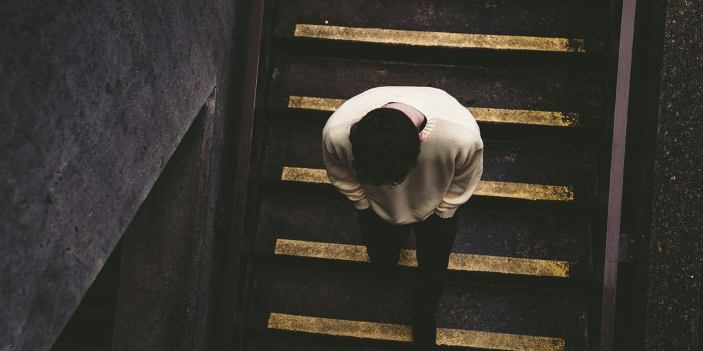 man walking on staircase