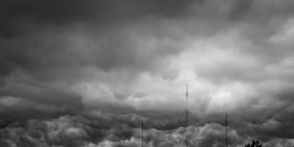 a black and white photo of a cloudy sky