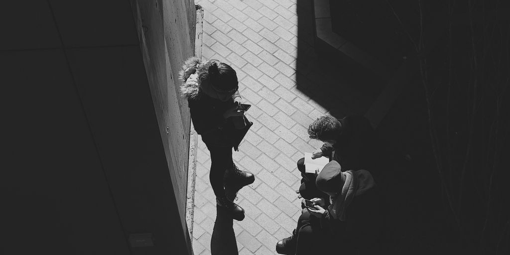 a couple of people standing next to each other