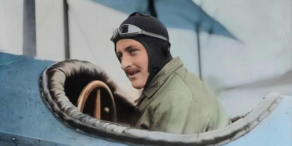 man inside biplane