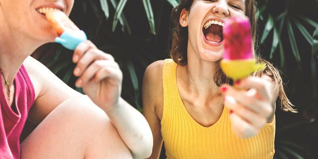 swimmer eating honey stinger waffle poolside
