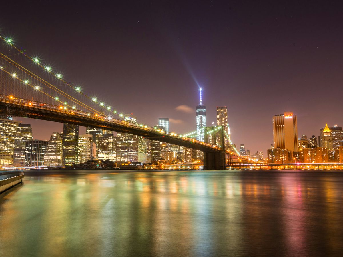 bridge over water during night time
