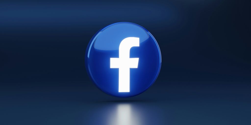 a blue logo with a white cross