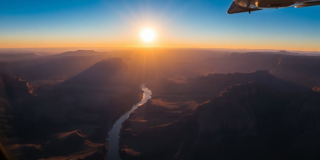 An aerial photograph of the Grand Canyon at sunrise.