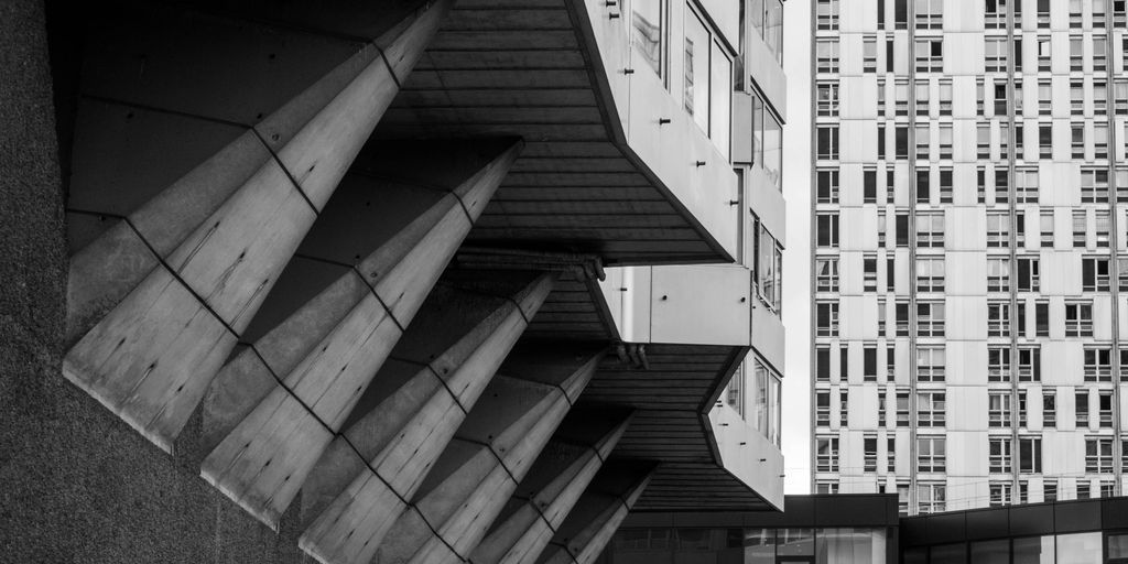 grayscale photo of concrete building