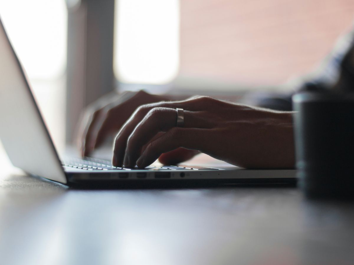 person using laptop