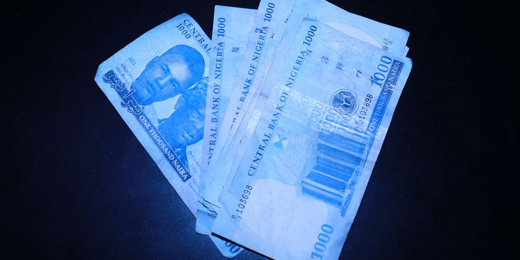 a bunch of money sitting on top of a table