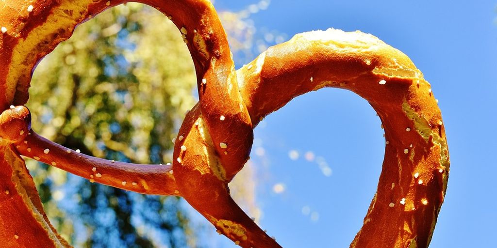 swimmer eating pretzels poolside