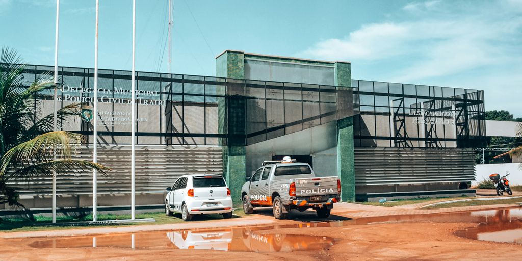 a couple of trucks parked in front of a building