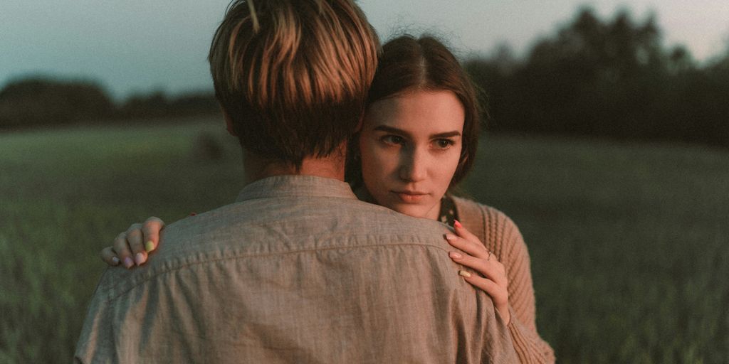a man and woman hugging