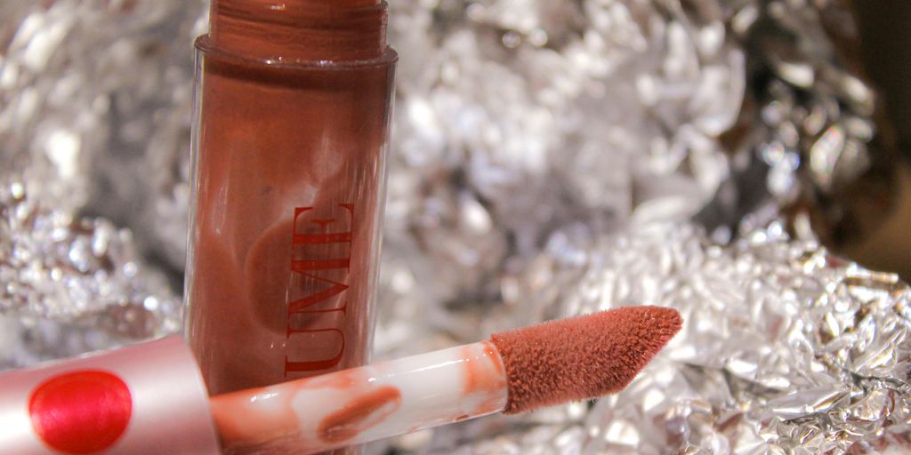 a close up of a lipstick on a piece of tin foil