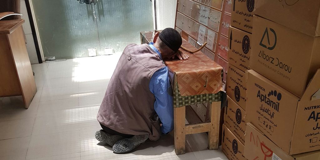 man sitting on floor