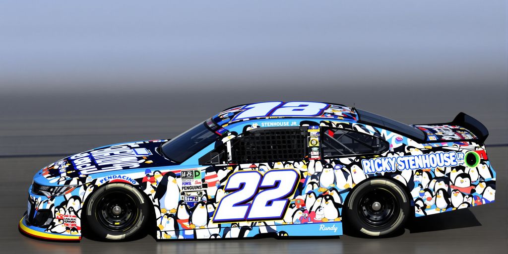 Ricky Stenhouse Jr. driving a race car with a penguin paint scheme.
