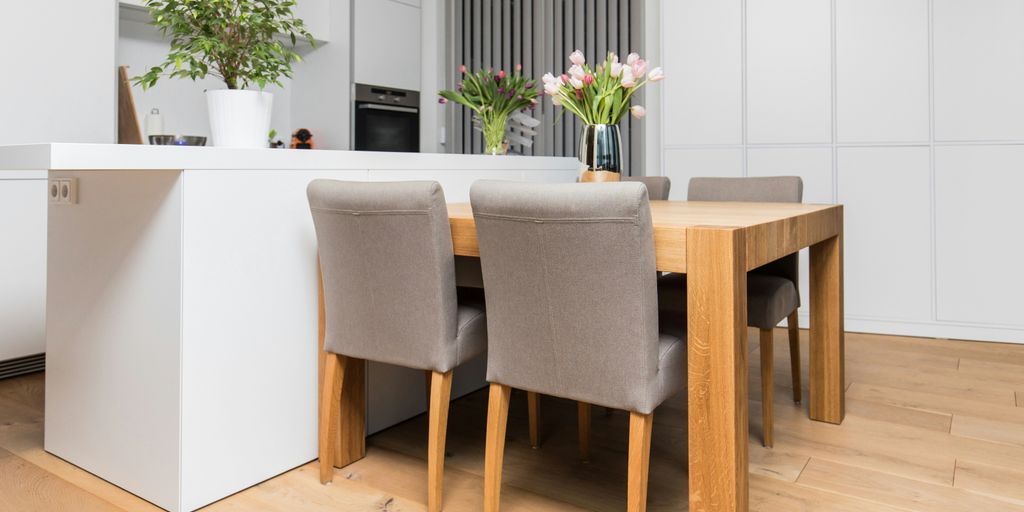 brown wooden table with chairs