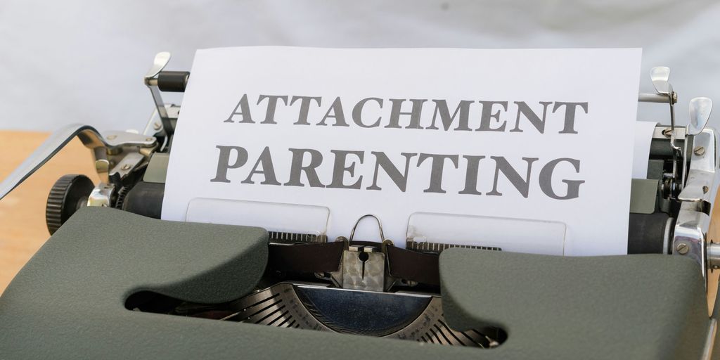 a close up of a typewriter with a sign attached to it
