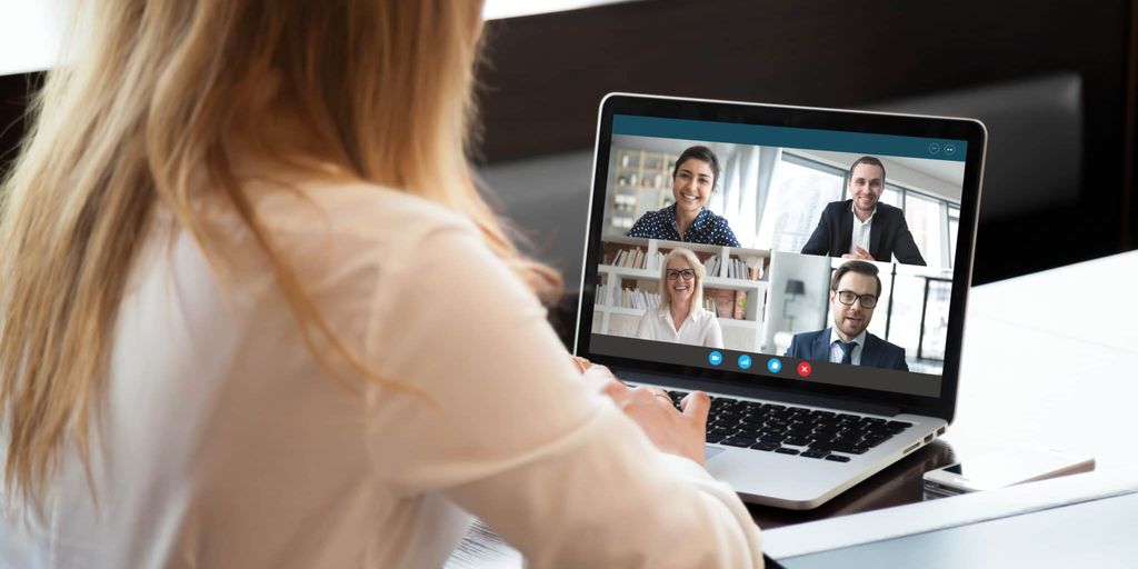 futuristic technology and human collaboration, people working with advanced robots and computers in a modern office
